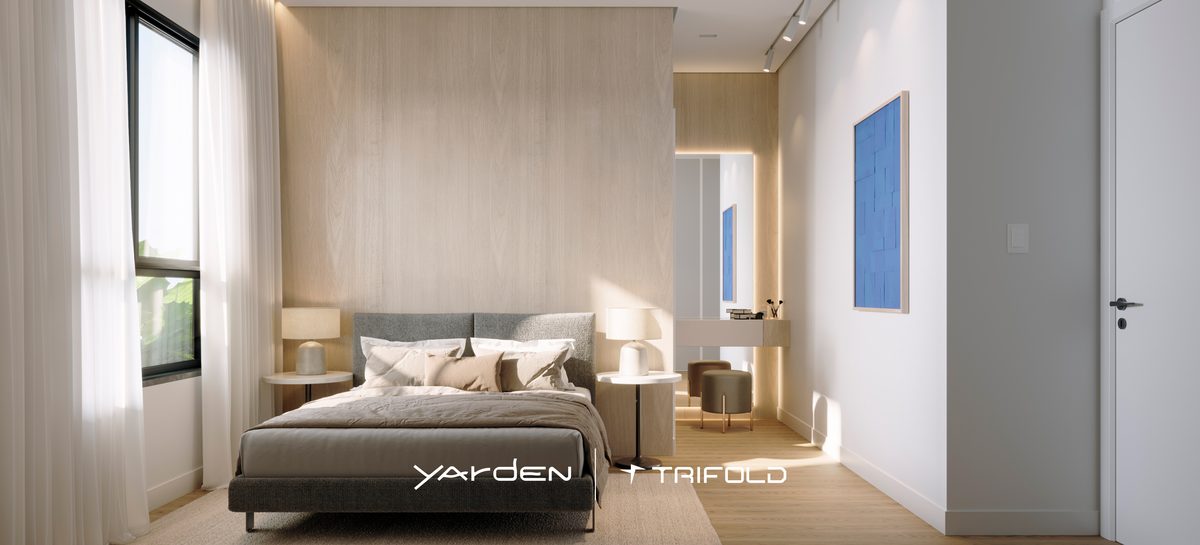 Suíte do apartamento decorado do Yarden, com cama de casal, painel de madeira e penteadeira
